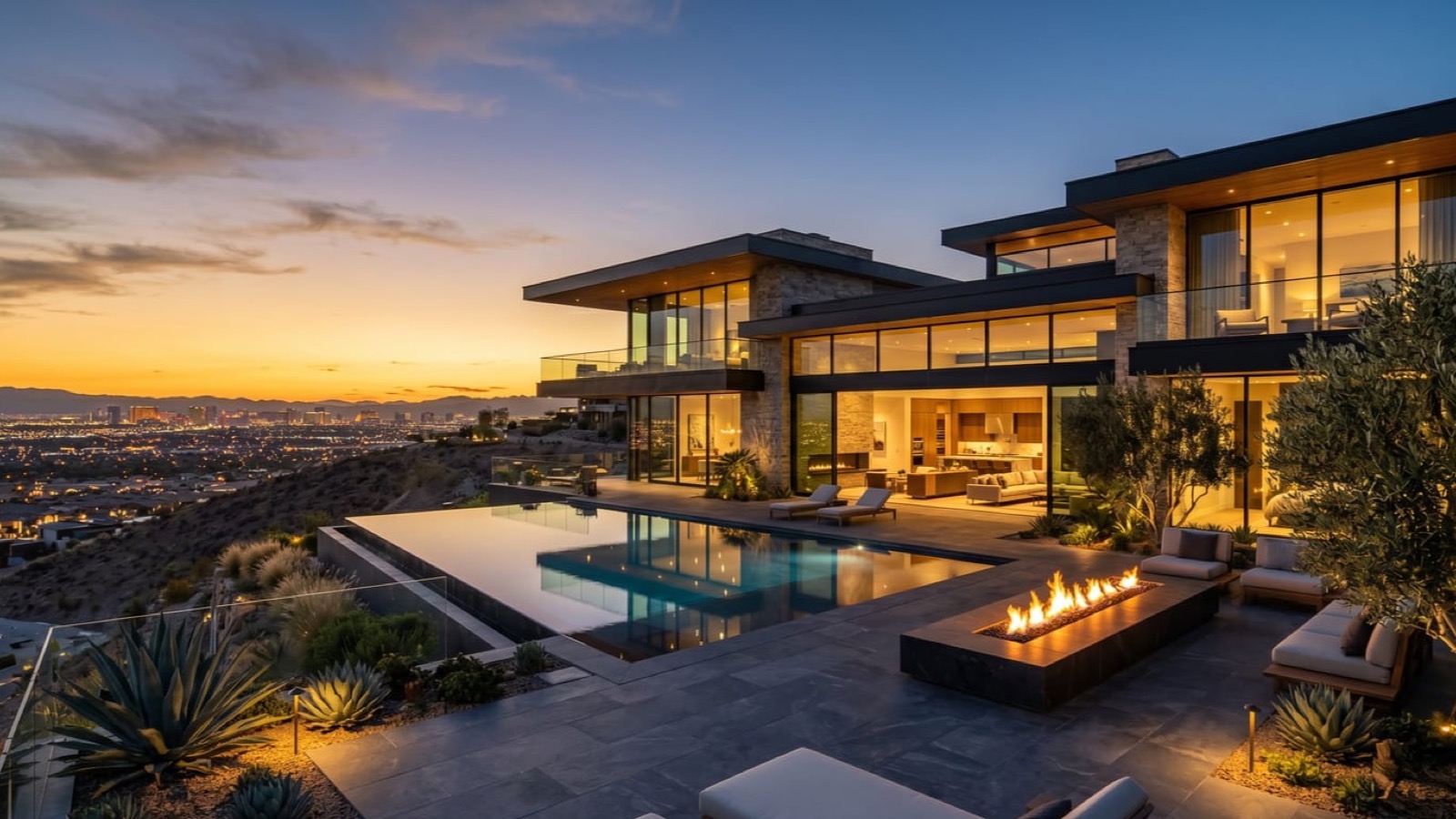 Las Vegas hillside custom estate with Strip skyline view, NREG luxury desk covers Ascaya, MacDonald Highlands, Summit Club
