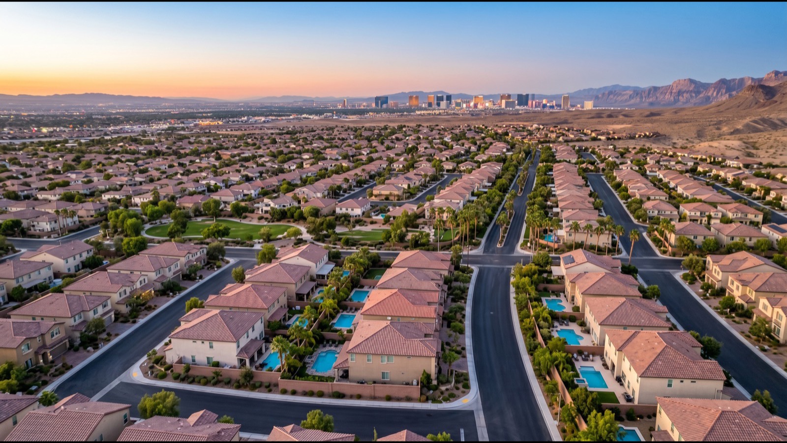 Residential neighborhood spread across the Las Vegas valley under a clear desert sky